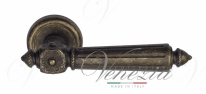 Ручка дверная на круглой розетке Venezia Castello D1 Бронза античная
