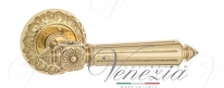 Ручка дверная на круглой розетке Venezia Castello D4 Латунь блестящая