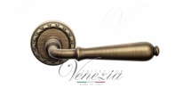 Ручка дверная на круглой розетке Venezia Classic D2 Бронза матовая