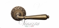 Ручка дверная на круглой розетке Venezia Classic D4 Бронза матовая
