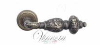Ручка дверная на круглой розетке Venezia Lucrecia D1 Бронза античная