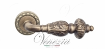 Ручка дверная на круглой розетке Venezia Lucrecia D2 Бронза матовая