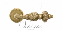 Ручка дверная на круглой розетке Venezia Lucrecia D3 Латунь блестящая
