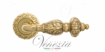 Ручка дверная на круглой розетке Venezia Lucrecia D4 Латунь блестящая