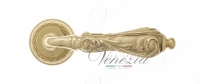 Ручка дверная на круглой розетке Venezia Monte Cristo D2 Латунь блестящая