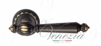 Ручка дверная на круглой розетке Venezia Pellestrina D2 Бронза темная