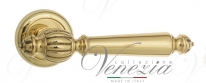 Ручка дверная на круглой розетке Venezia Pellestrina D1 Латунь блестящая