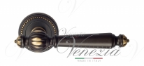 Ручка дверная на круглой розетке Venezia Pellestrina D3 Бронза темная