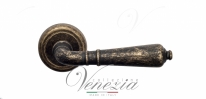 Ручка дверная на круглой розетке Venezia Vignole D1 Бронза античная