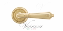 Ручка дверная на круглой розетке Venezia Vignole D2 Латунь блестящая