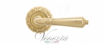 Ручка дверная на круглой розетке Venezia Vignole D4 Латунь блестящая