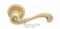 Ручка дверная на круглой розетке Venezia Vivaldi D2 Латунь блестящая