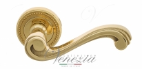 Ручка дверная на круглой розетке Venezia Vivaldi D3 Латунь блестящая