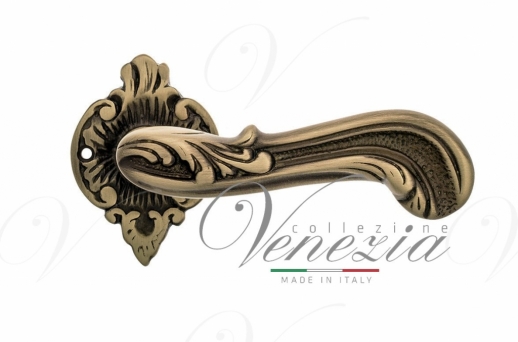 Ручка дверная на круглой розетке Venezia Giulietta D7 Бронза матовая