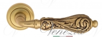 Ручка дверная на круглой розетке Venezia Monte Cristo D1 Золото французское + коричневый