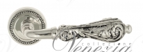 Ручка дверная на круглой розетке Venezia Monte Cristo D3 натуральное серебро + черный