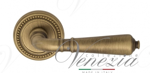 Ручка дверная на круглой розетке Venezia Vignole D3 Бронза матовая