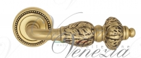 Ручка дверная на круглой розетке Venezia Lucrecia D3 Золото французское + коричневый