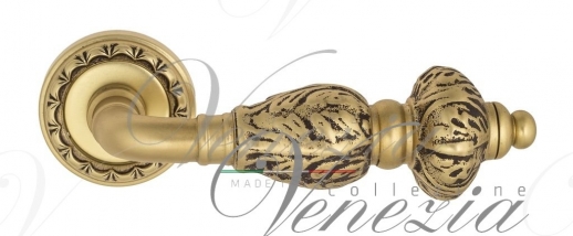 Ручка дверная на круглой розетке Venezia Lucrecia D2 Золото французское + коричневый