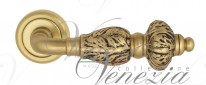 Ручка дверная на круглой розетке Venezia Lucrecia D1 Золото французское + коричневый