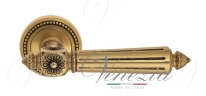 Ручка дверная на круглой розетке Venezia Castello D3 Золото французское + коричневый