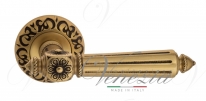 Ручка дверная на круглой розетке Venezia Castello D4 Золото французское + коричневый