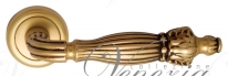 Ручка дверная на круглой розетке Venezia Olimpo D1 Золото французское + коричневый