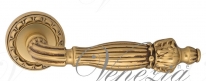 Ручка дверная на круглой розетке Venezia Olimpo D2 Золото французское + коричневый