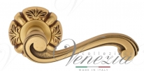 Ручка дверная на круглой розетке Venezia Vivaldi D5 Золото французское + коричневый