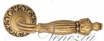 Ручка дверная на круглой розетке Venezia Olimpo D4 Золото французское + коричневый