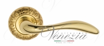 Ручка дверная на круглой розетке Venezia Alessandra D4 Латунь блестящая