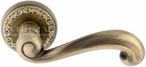 Ручка дверная на круглой розетке Extreza BERTA (Берта) 312  R06 Бронза матовая F03