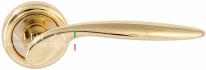 Ручка дверная на круглой розетке Extreza CALIPSO (Калипсо) 311  R01 Латунь блестящая F01