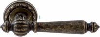 Ручка дверная на круглой розетке Extreza DANIEL (Даниел) 308  R02 Бронза античная F23