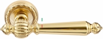 Ручка дверная на круглой розетке Extreza DANIEL (Даниел) 308  R02 Латунь блестящая F01