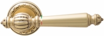 Ручка дверная на круглой розетке Extreza DANIEL (Даниел) 308  R02 Золото французское + коричневый F59