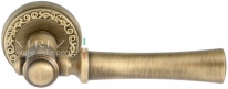 Ручка дверная на круглой розетке Extreza DEZI (Дези) 309  R06 Бронза матовая F03