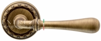 Ручка дверная на круглой розетке Extreza EVA (Ева) 319  R02 Бронза матовая F03
