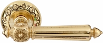 Ручка дверная на круглой розетке Extreza LEON (Леон) 303  R04 полированное золото F01