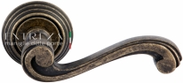 Ручка дверная на круглой розетке Extreza LINA (Лина) 313  R05 Бронза античная F23