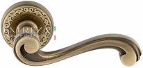 Ручка дверная на круглой розетке Extreza LINA (Лина) 313  R06 Бронза матовая F03