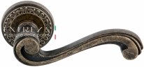 Ручка дверная на круглой розетке Extreza LINA (Лина) 313  R06 Бронза античная F23