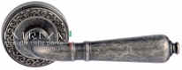 Ручка дверная на круглой розетке Extreza PETRA (Петра) 304  R06 Серебро античное F45