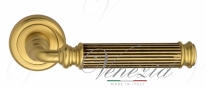 Ручка дверная на круглой розетке Venezia Mosca D1 Золото французское + коричневый