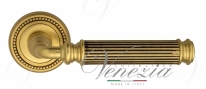 Ручка дверная на круглой розетке Venezia Mosca D3 Золото французское + коричневый