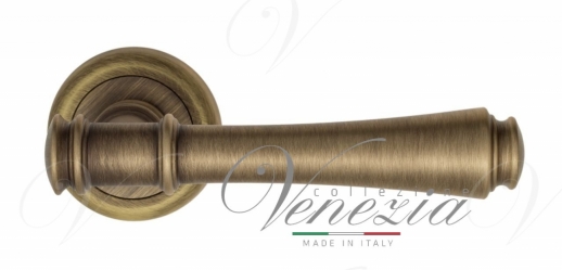 Ручка дверная на круглой розетке Venezia Callisto D1 Бронза матовая