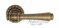 Ручка дверная на круглой розетке Venezia Callisto D2 Бронза матовая
