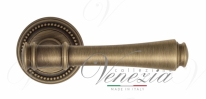Ручка дверная на круглой розетке Venezia Callisto D3 Бронза матовая
