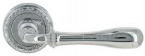 Ручка дверная на круглой розетке Extreza CARRERA (Каррера) 321 R06 Хром полированный F04