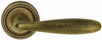 Ручка дверная на круглой розетке Extreza VIGO (Виго) 324 R03 Бронза матовая F03